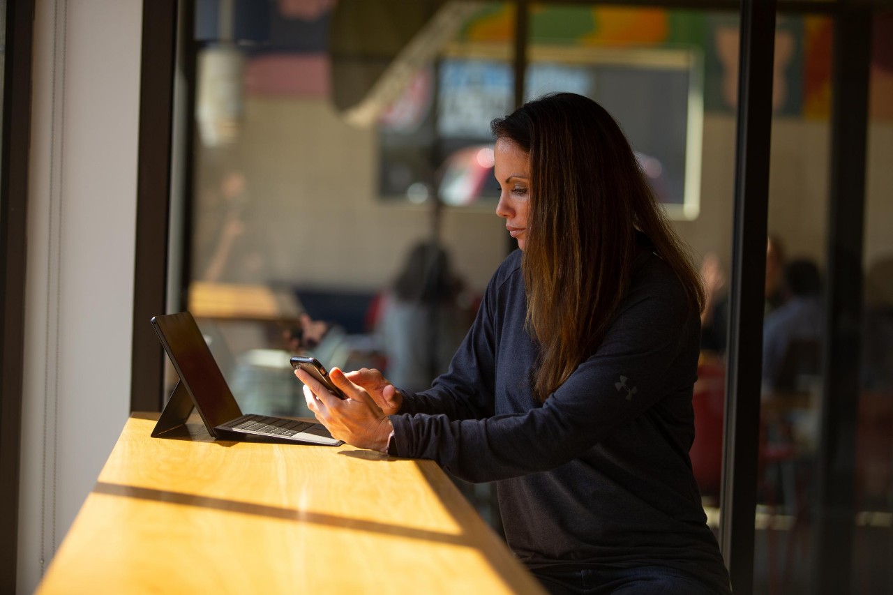 Models pose for UC Online marketing.